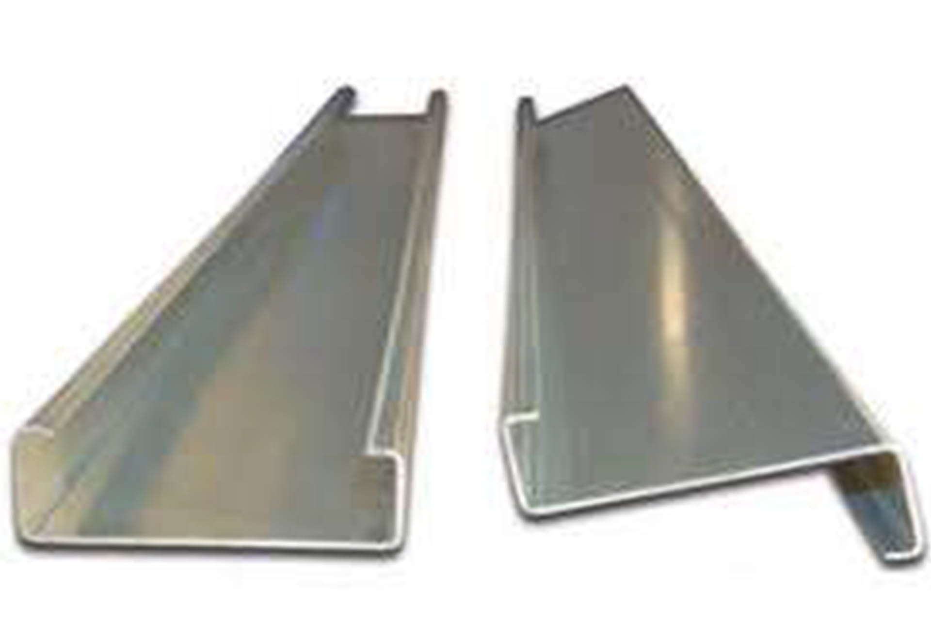 C-Shape and Z-Shape Steel Sections Close-up of C-shaped and Z-shaped steel sections used in the construction of pre-engineered buildings.