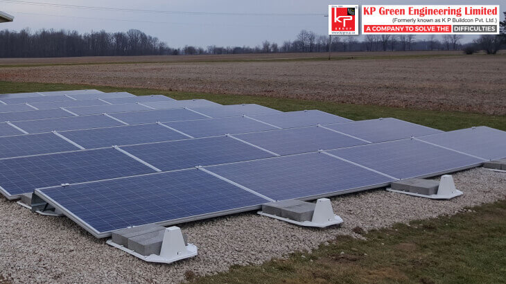 ground-mounted solar system in an open field, with panels tilted for optimal sun exposure.