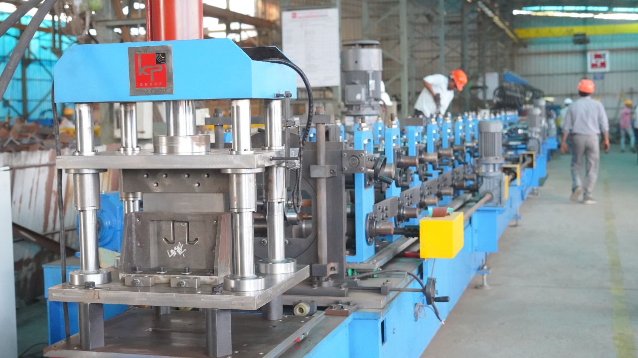 A large-scale manufacturing machine in operation at a KP Green Engineering plant.