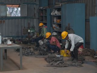 Stacks of fabricated steel components ready for galvanizing at a KP Green Engineering facility.